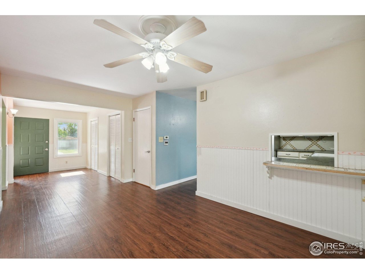 2001 Evergreen Drive Fort Collins, CO 80521 - Photo 4 of 39 a view of an empty room with wooden floor
