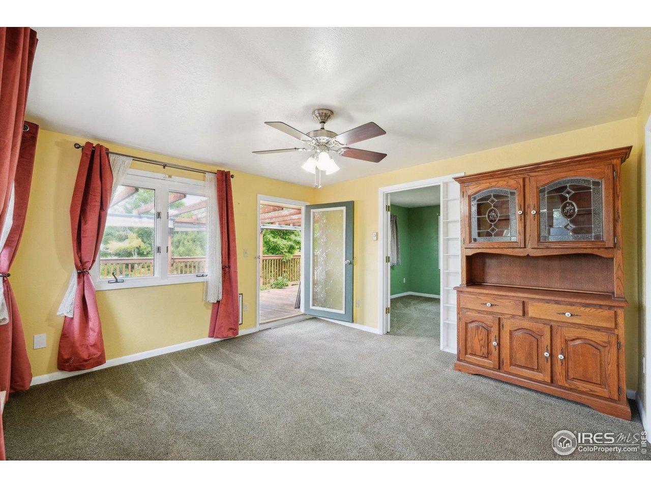 2001 Evergreen Drive Fort Collins, CO 80521 - Photo 6 of 39 a living room with furniture and a large window