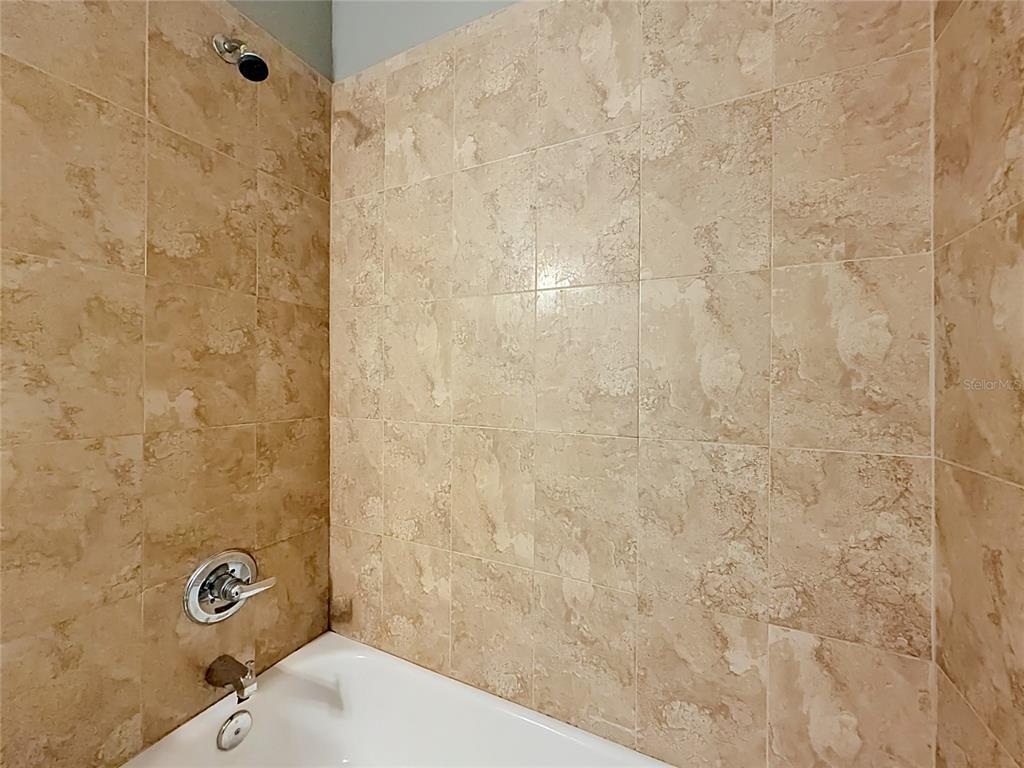 28549 Shirley Shores Road Tavares, FL 32778 - Photo 41 of 65 a bathroom with a shower and a toilet