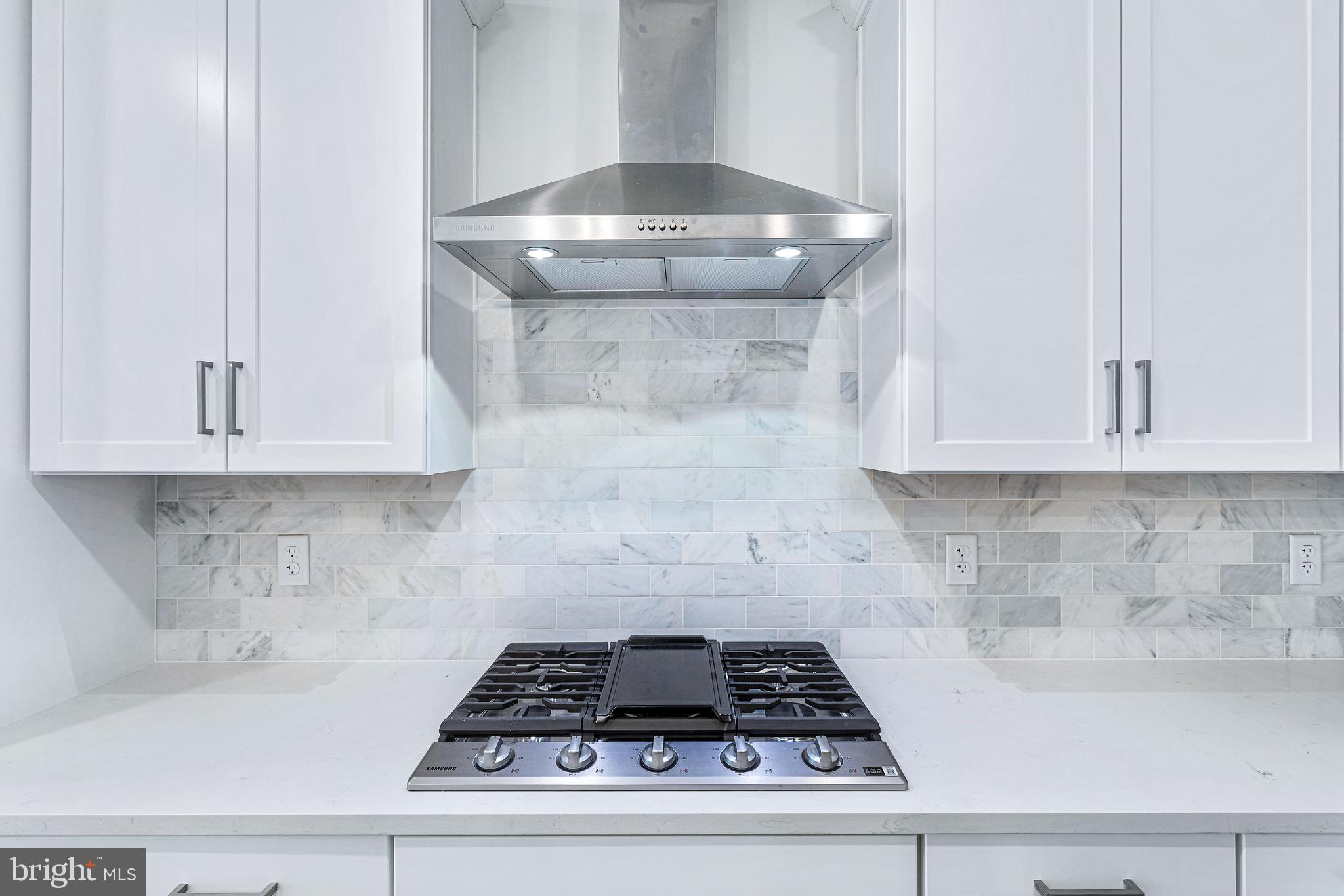 76 Old Mill Bottom Road North, Unit 308 Annapolis, MD 21409 - Photo 21 of 38 a kitchen with a stove and cabinets