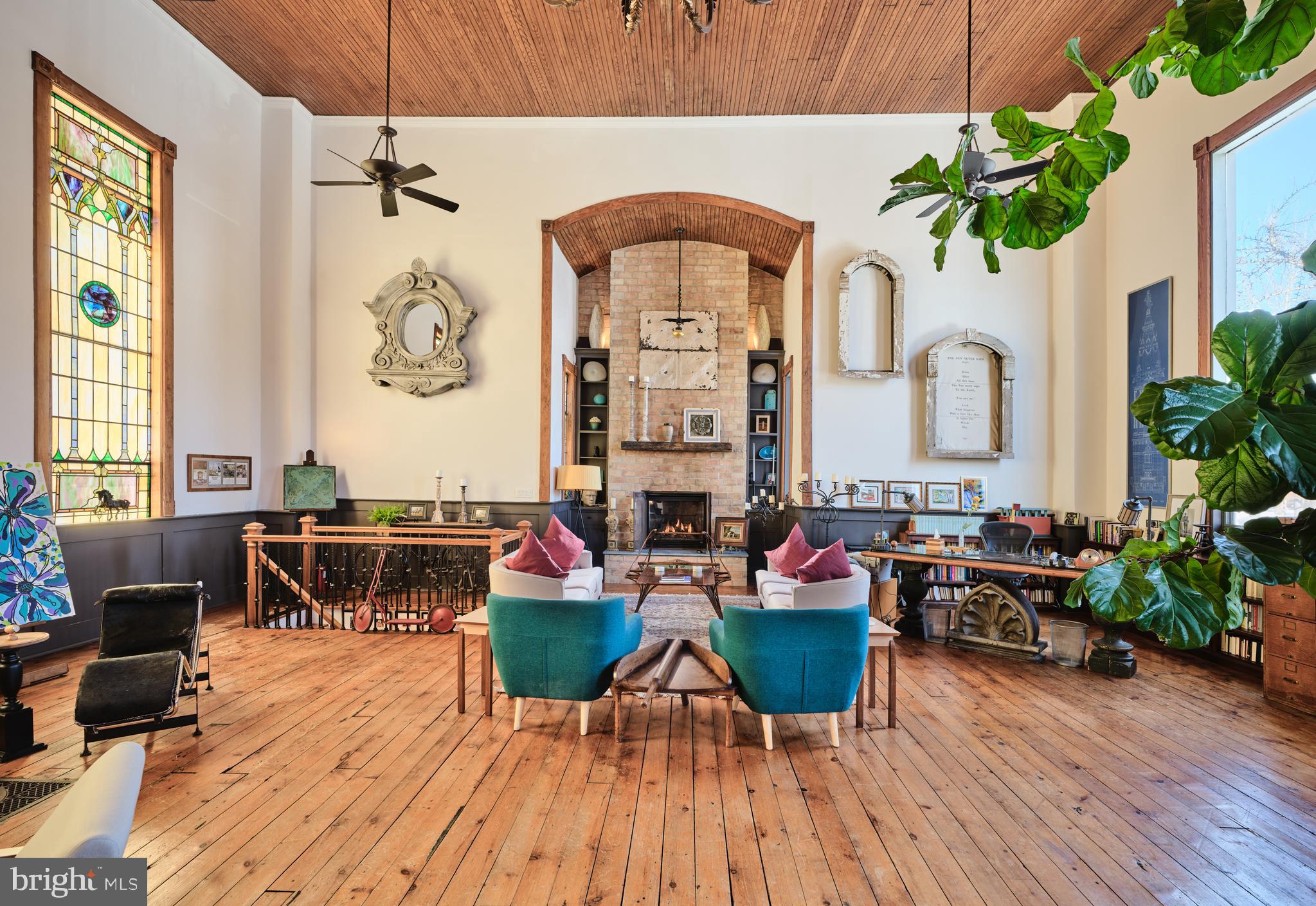 5 Water Street Lebanon, NJ 08833 - Photo 15 of 47 a living room with furniture a fireplace and potted plants