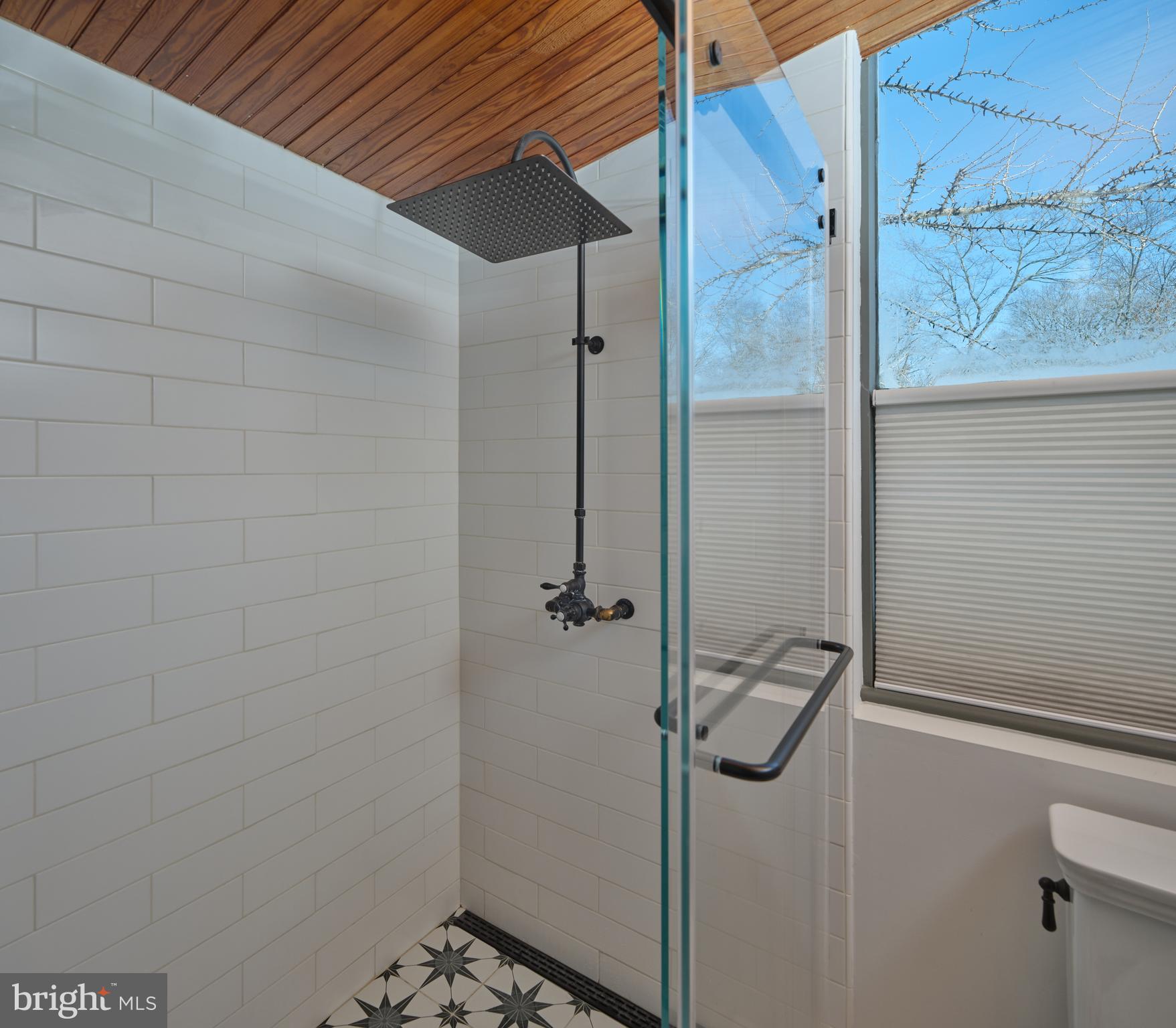 5 Water Street Lebanon, NJ 08833 - Photo 18 of 47 a bathroom with a glass door shower