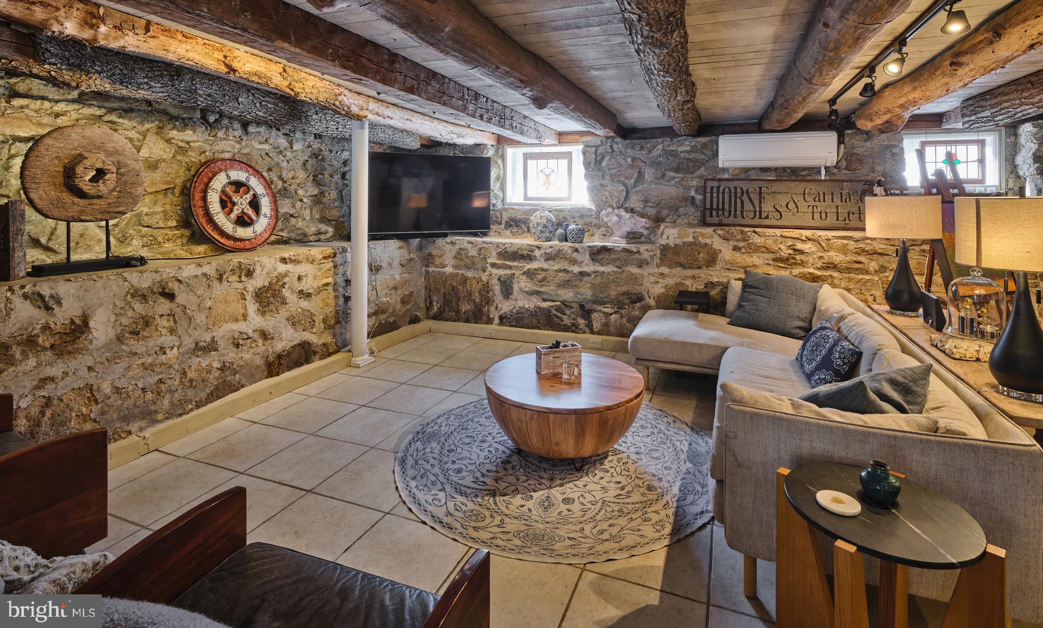 5 Water Street Lebanon, NJ 08833 - Photo 28 of 47 a living room with furniture and a clock