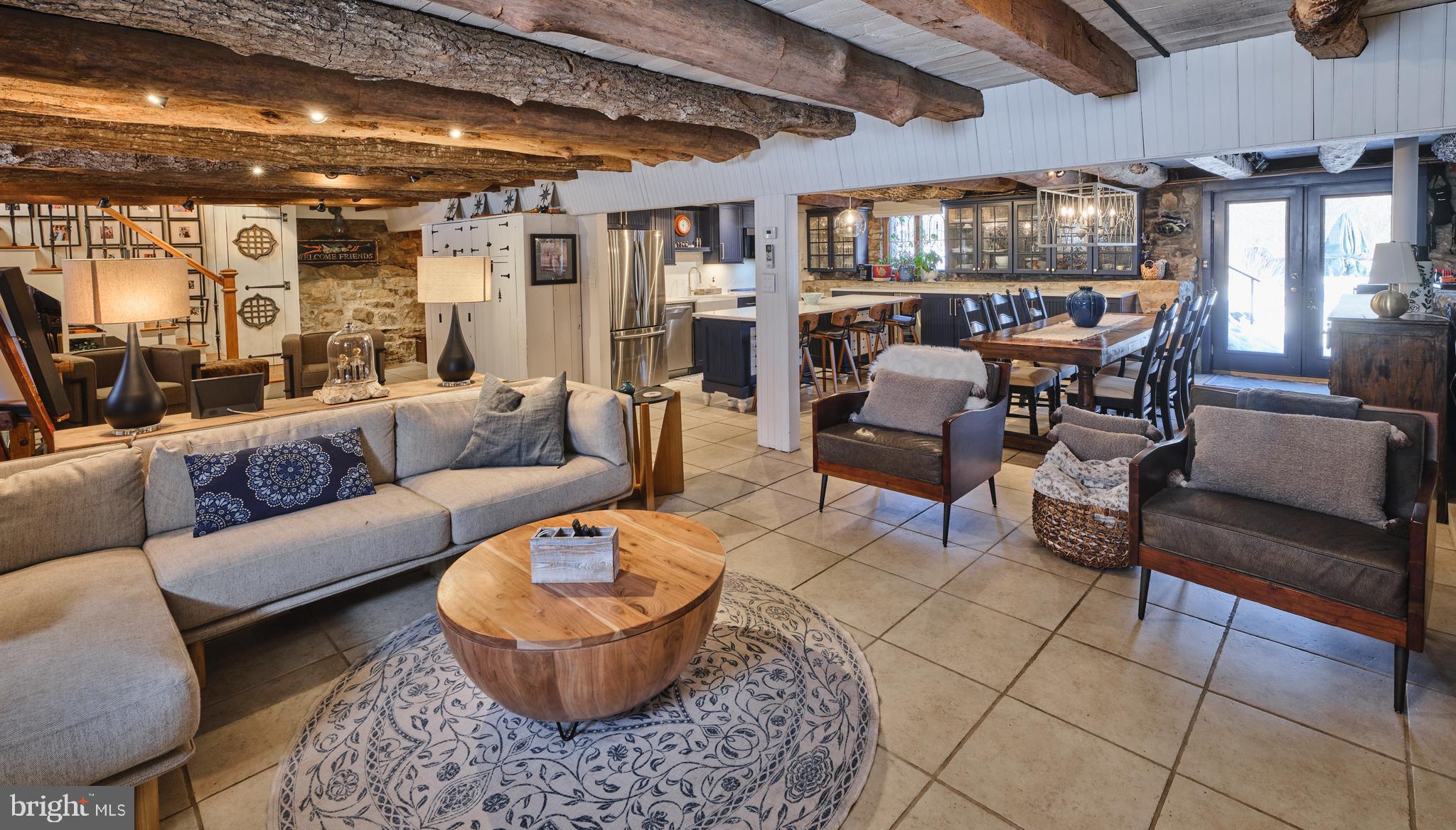 5 Water Street Lebanon, NJ 08833 - Photo 29 of 47 a living room with furniture and a chandelier