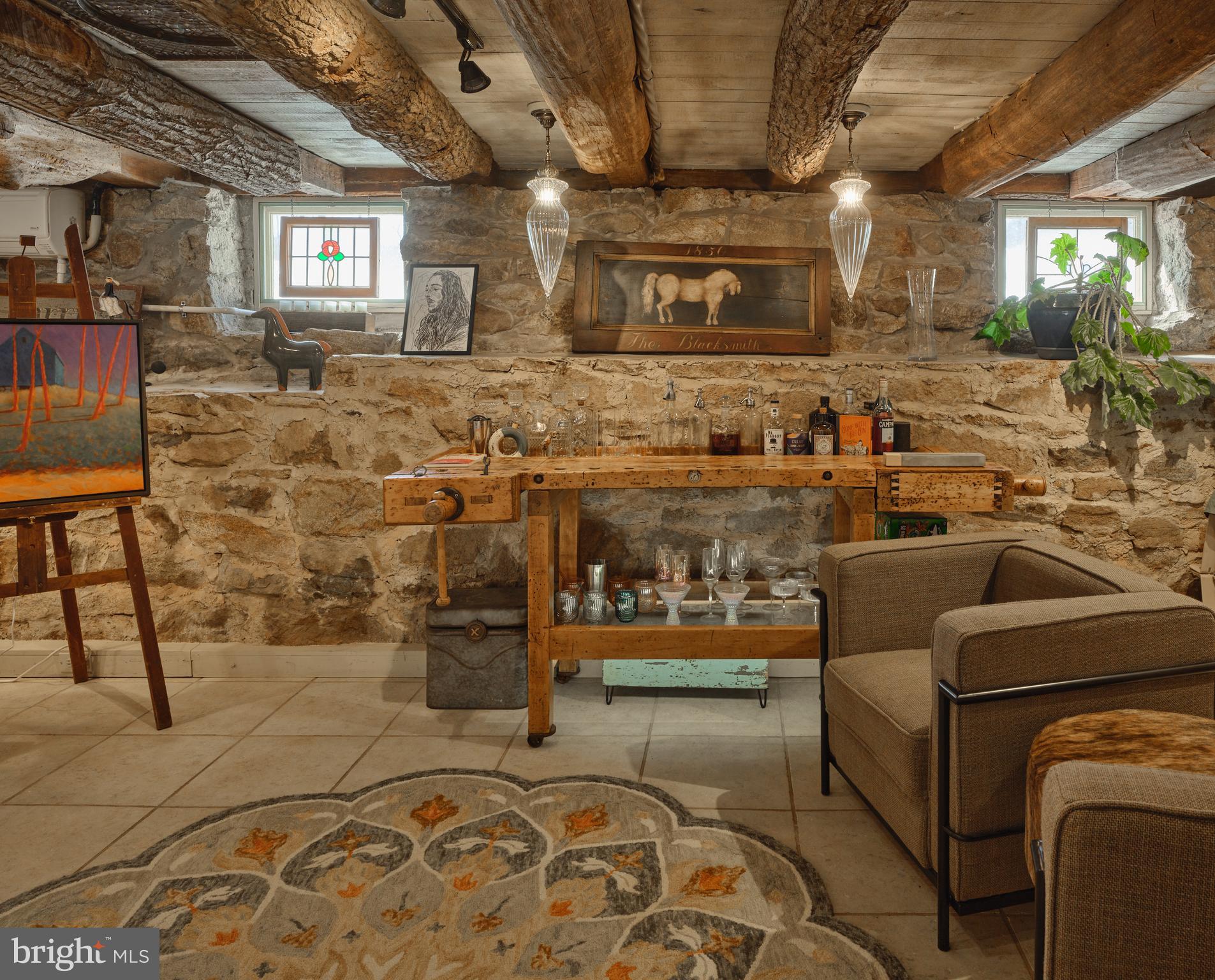 5 Water Street Lebanon, NJ 08833 - Photo 37 of 47 a room with stainless steel appliances kitchen island granite countertop furniture and a fireplace
