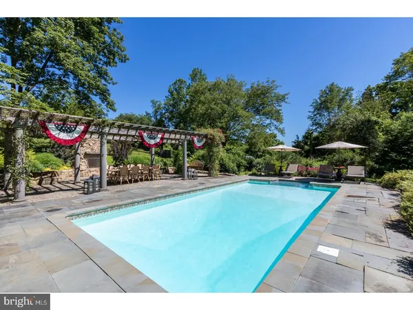 a view of yard with patio