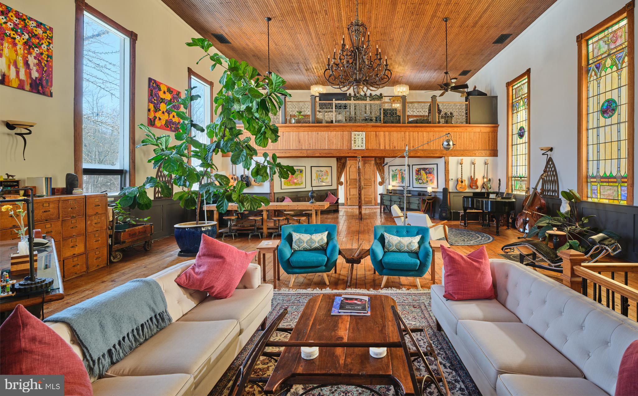 5 Water Street Lebanon, NJ 08833 - Photo 6 of 47 a living room with patio furniture and a chandelier
