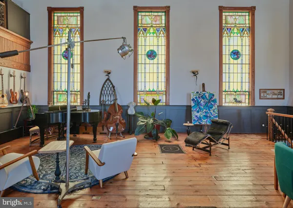 a view of a chairs and table in the patio