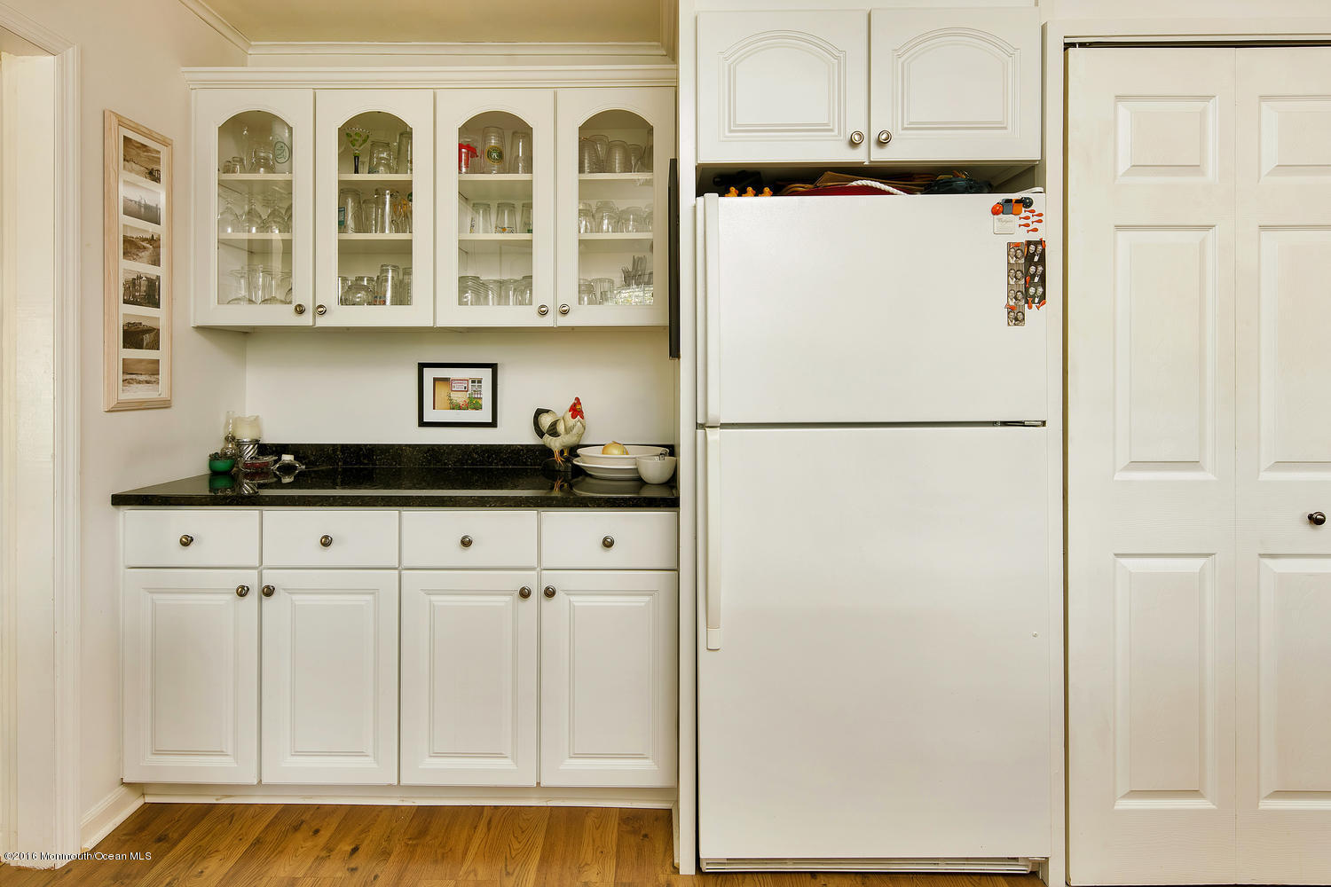 717 Schoolhouse Road Brielle, NJ 08730 - Photo 12 of 22 a white refrigerator freezer sitting in a kitchen
