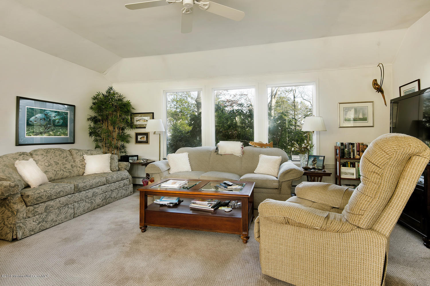 717 Schoolhouse Road Brielle, NJ 08730 - Photo 20 of 22 a living room with furniture and a large window