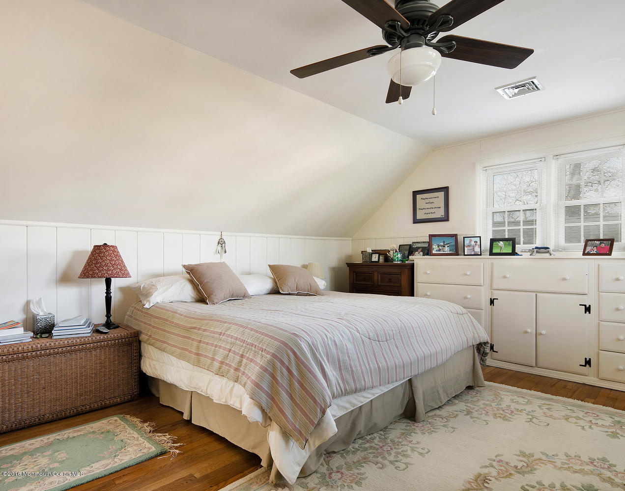 717 Schoolhouse Road Brielle, NJ 08730 - Photo 22 of 22 a bedroom with a bed and ceiling fan
