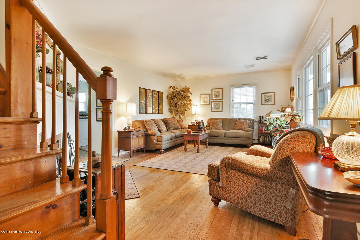 717 Schoolhouse Road Brielle, NJ 08730 - Photo 5 of 22 a living room with furniture or couch and a large window