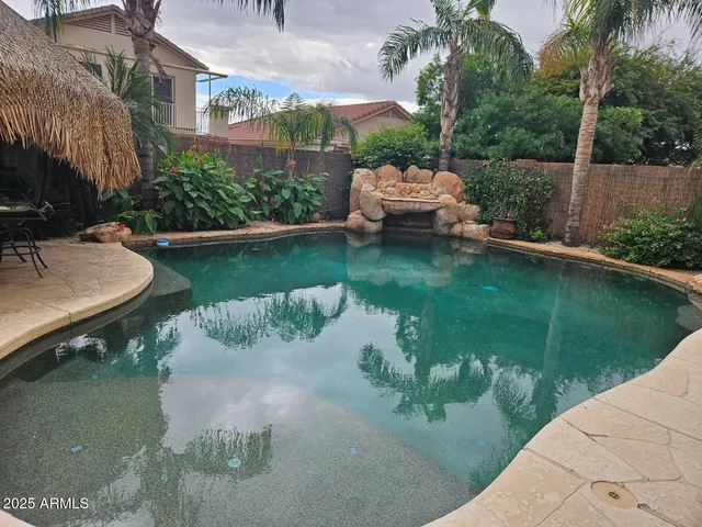 a view of a lake with a yard