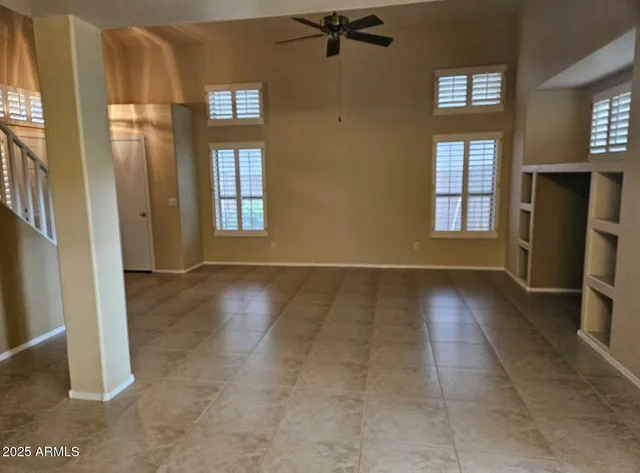 a kitchen with stainless steel appliances granite countertop a refrigerator stove and sink