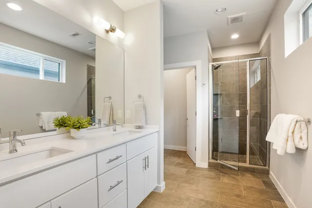 a view of a workspace with furniture and a potted plant
