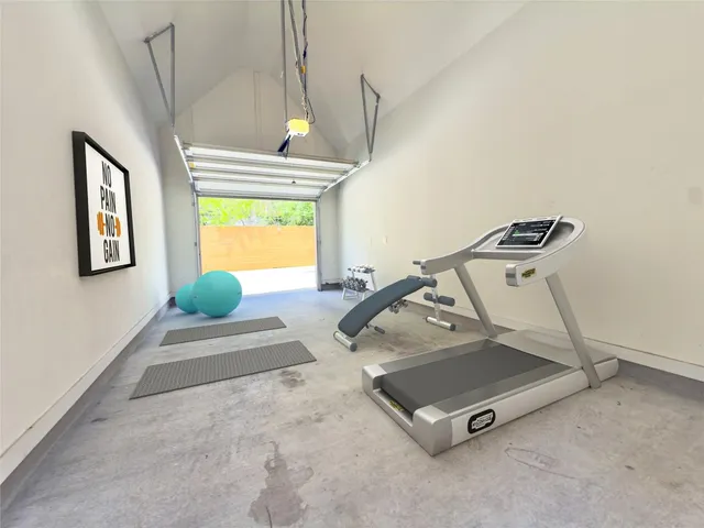 a view of a house with a parking space