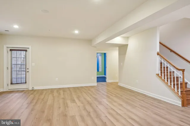 an aerial view of a houses with a yard