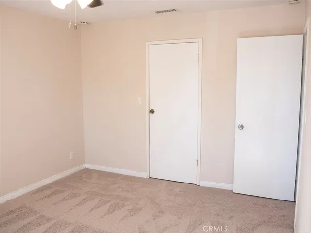a bathroom with a shower and a mirror