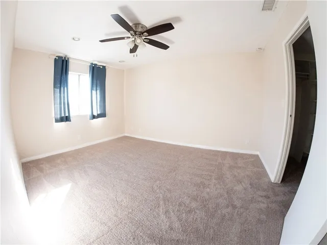 a bathroom with a shower and a bath tub