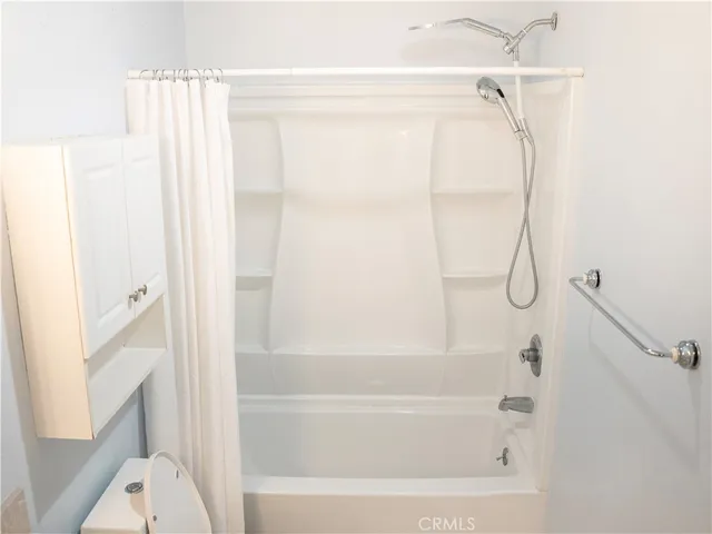 a bathroom with a sink and a shower