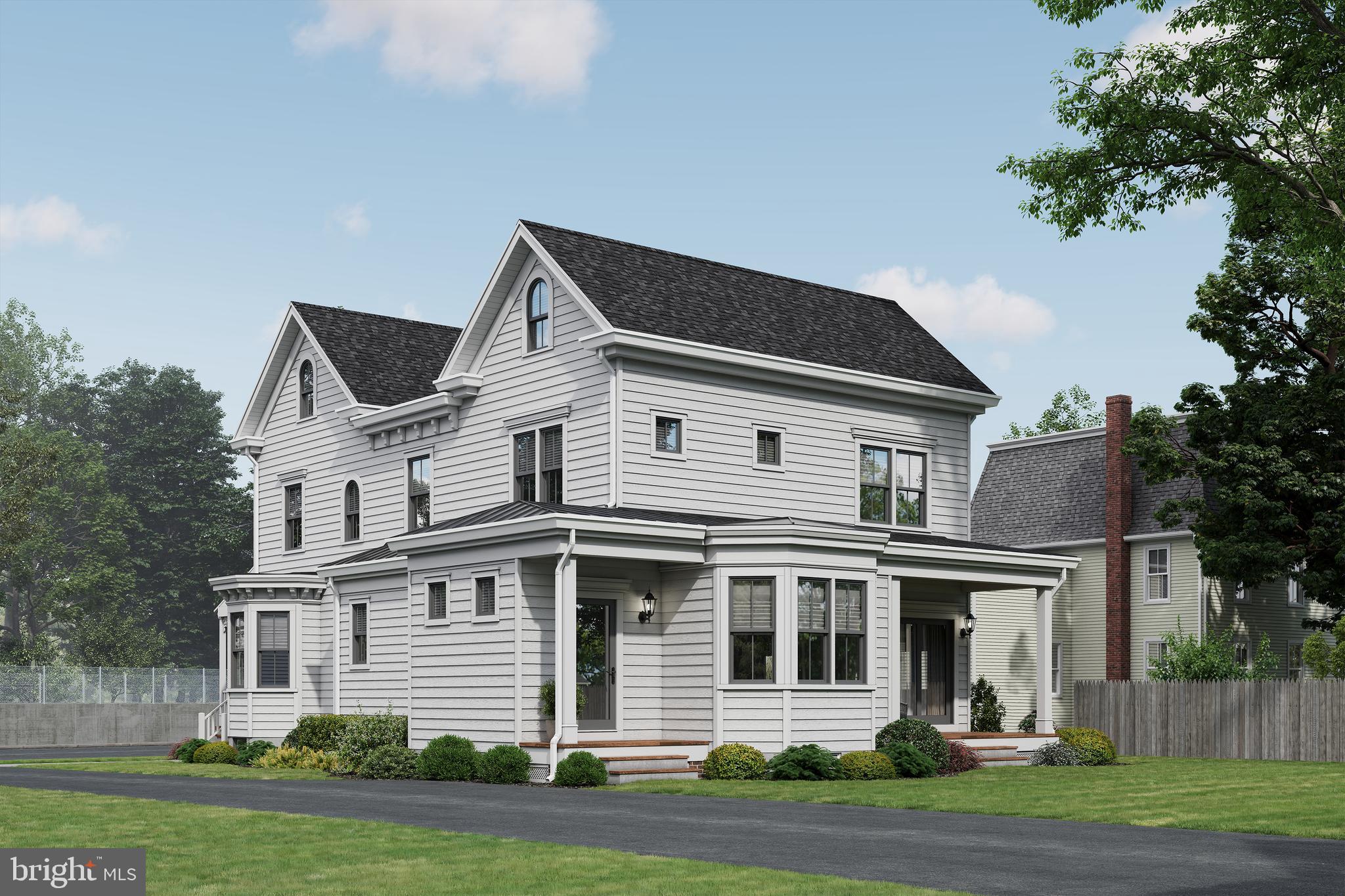 109 South Atlantic Avenue Haddonfield, NJ 08033 - Photo 4 of 5 a front view of a house with a yard