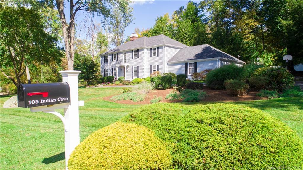 105 Indian Cave Road Ridgefield, CT 06877 - Photo 1 of 1 a front view of a house with garden