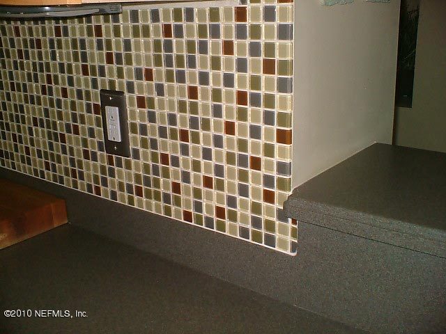 6130 Wakulla Springs Road Jacksonville, FL 32258 - Photo 15 of 45 Solid Surface Counters w Glass Tile BkSp