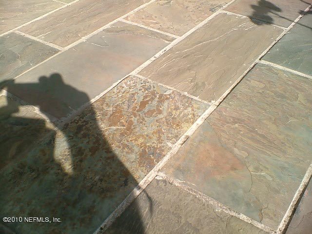 6130 Wakulla Springs Road Jacksonville, FL 32258 - Photo 35 of 45 Screened Lanai Stone Floor