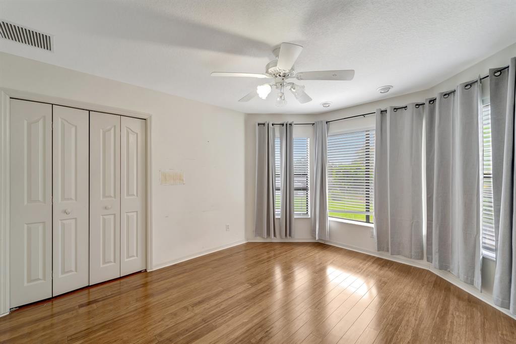 8040 Conservatory Circle Sarasota, FL 34243 - Photo 15 of 52 a view of an empty room with a window