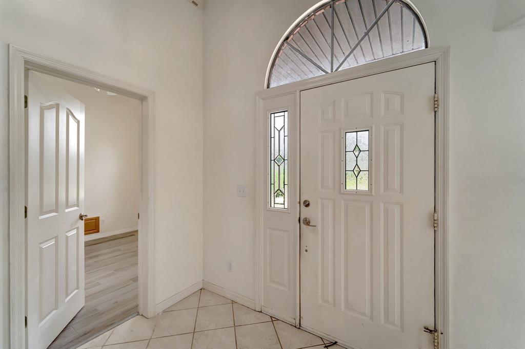 8040 Conservatory Circle Sarasota, FL 34243 - Photo 5 of 52 a view of an entryway with a livingroom