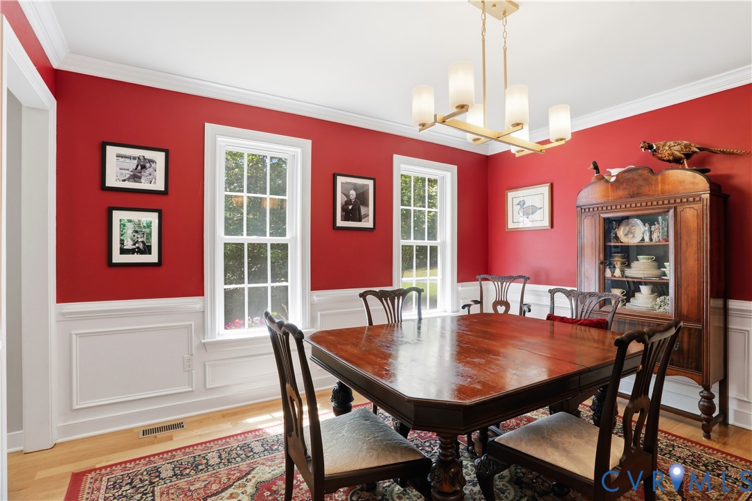 1570 Rock Castle Road Goochland, VA 23063 - Photo 10 of 53 Dining area with hardwood flooring, white crown mo