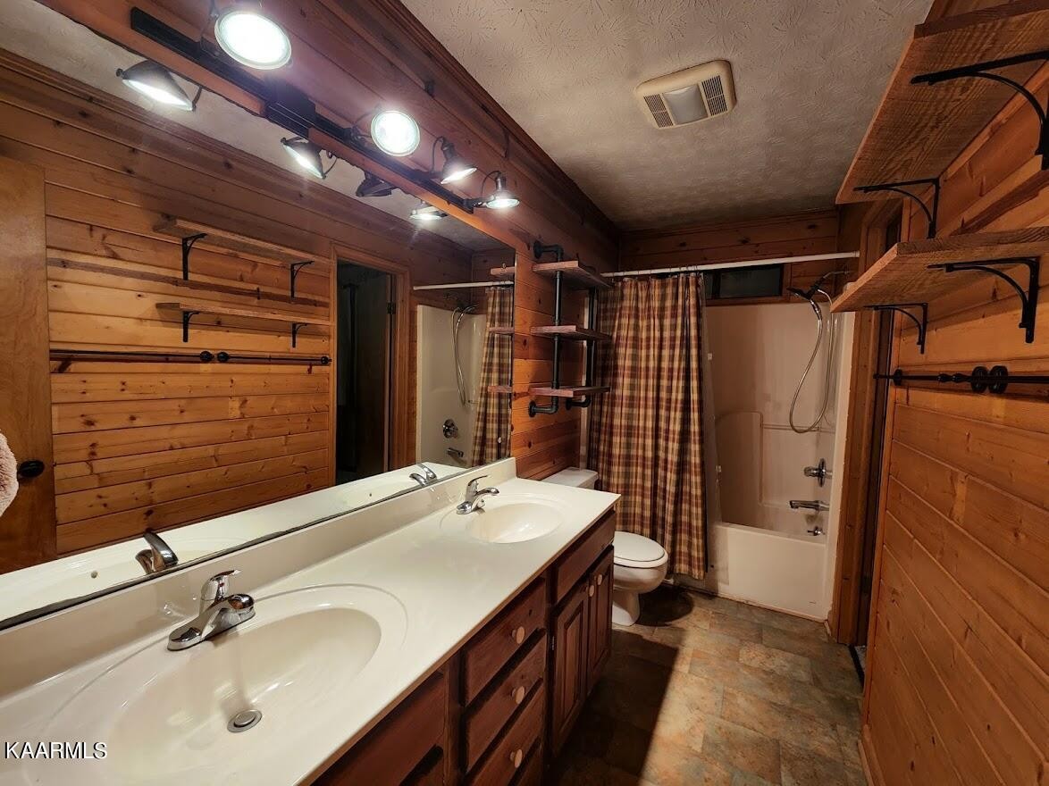 3390 Rocky Ridge Road Cosby, TN 37722 - Photo 11 of 45 a bathroom with a sink shower and a mirror