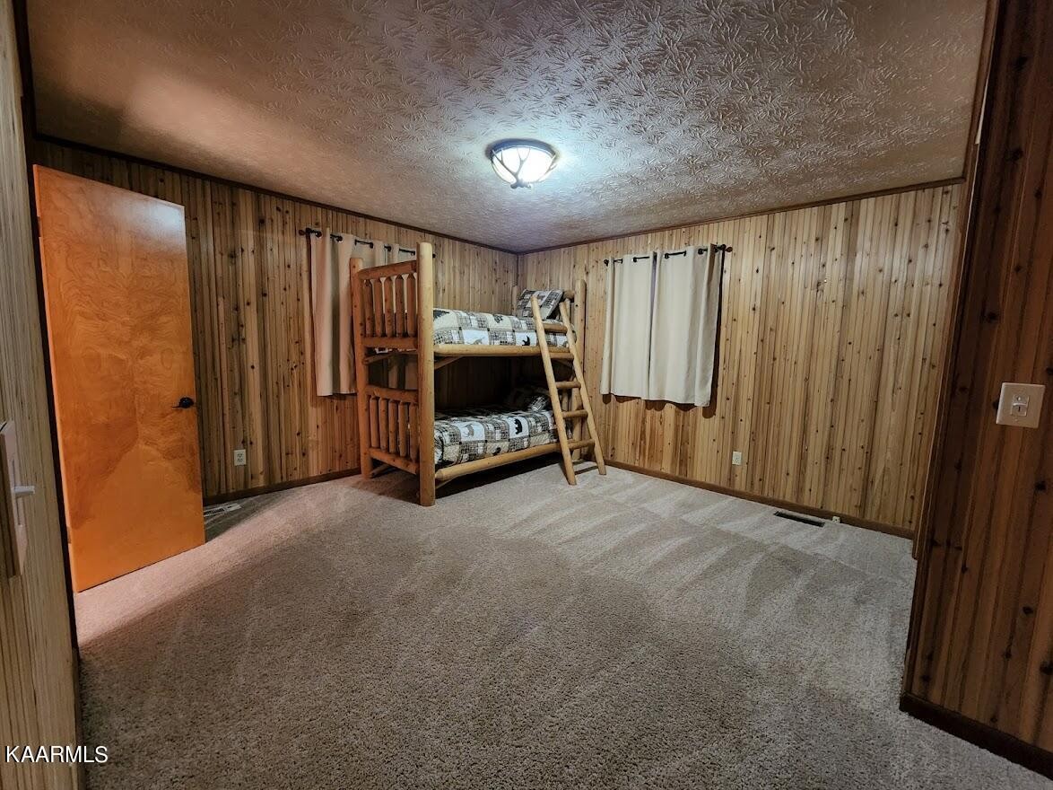 3390 Rocky Ridge Road Cosby, TN 37722 - Photo 12 of 45 a view of an empty room with a window