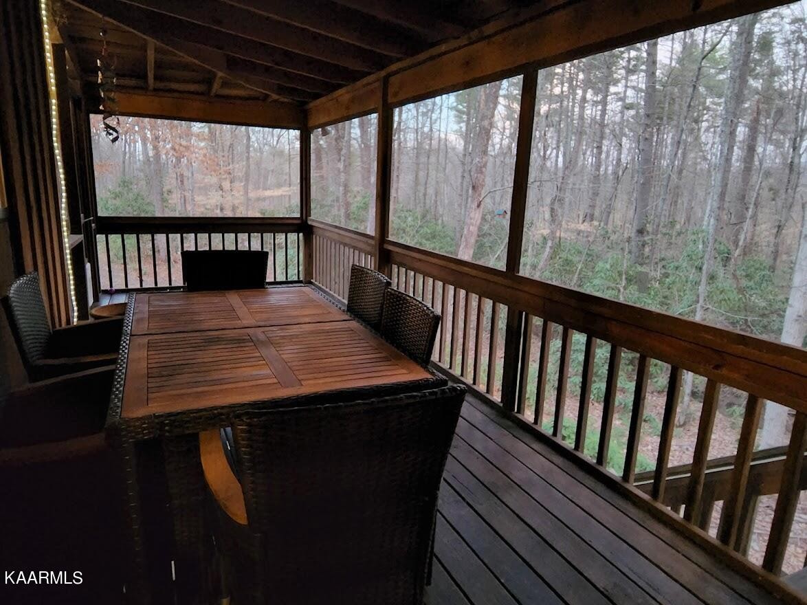 3390 Rocky Ridge Road Cosby, TN 37722 - Photo 23 of 45 a view of a balcony with furniture
