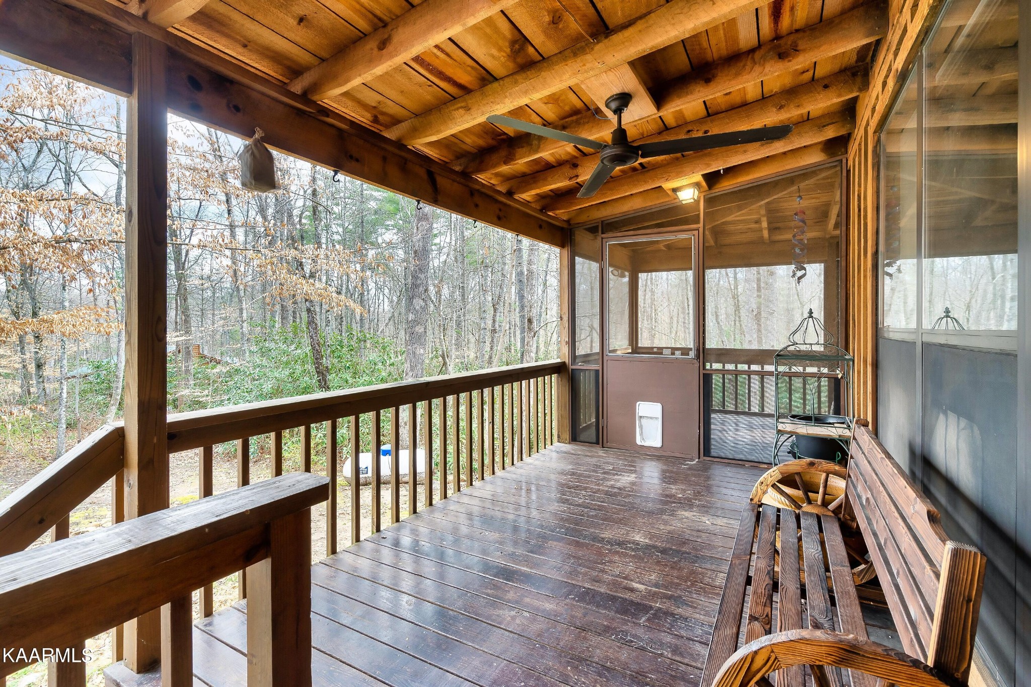 3390 Rocky Ridge Road Cosby, TN 37722 - Photo 29 of 45 a view of a porch with wooden floor