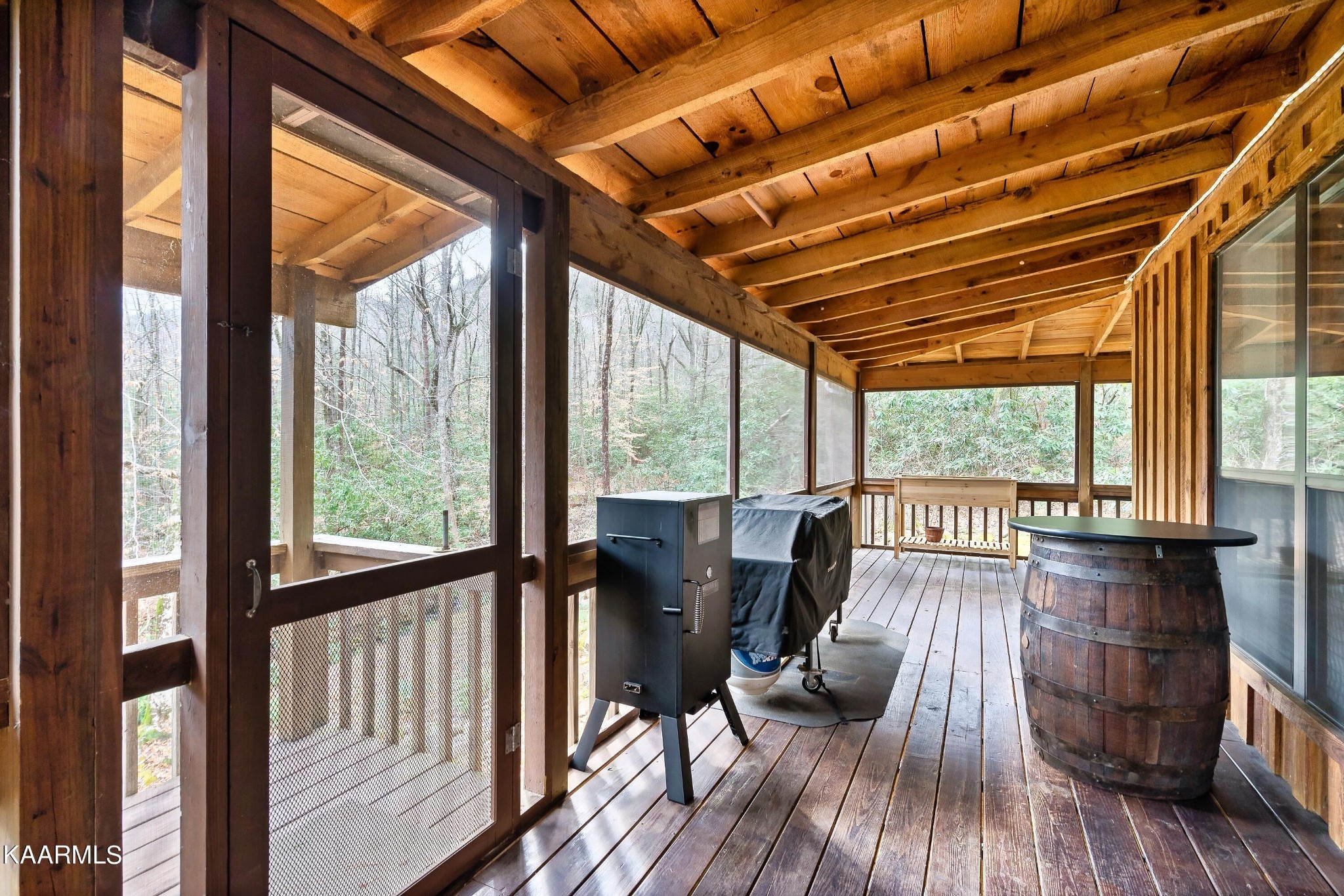 3390 Rocky Ridge Road Cosby, TN 37722 - Photo 30 of 45 a view of a living room with wooden floor and furniture