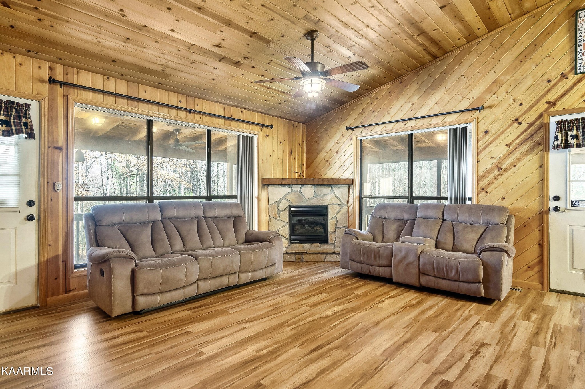 3390 Rocky Ridge Road Cosby, TN 37722 - Photo 33 of 45 a living room with furniture and a fireplace