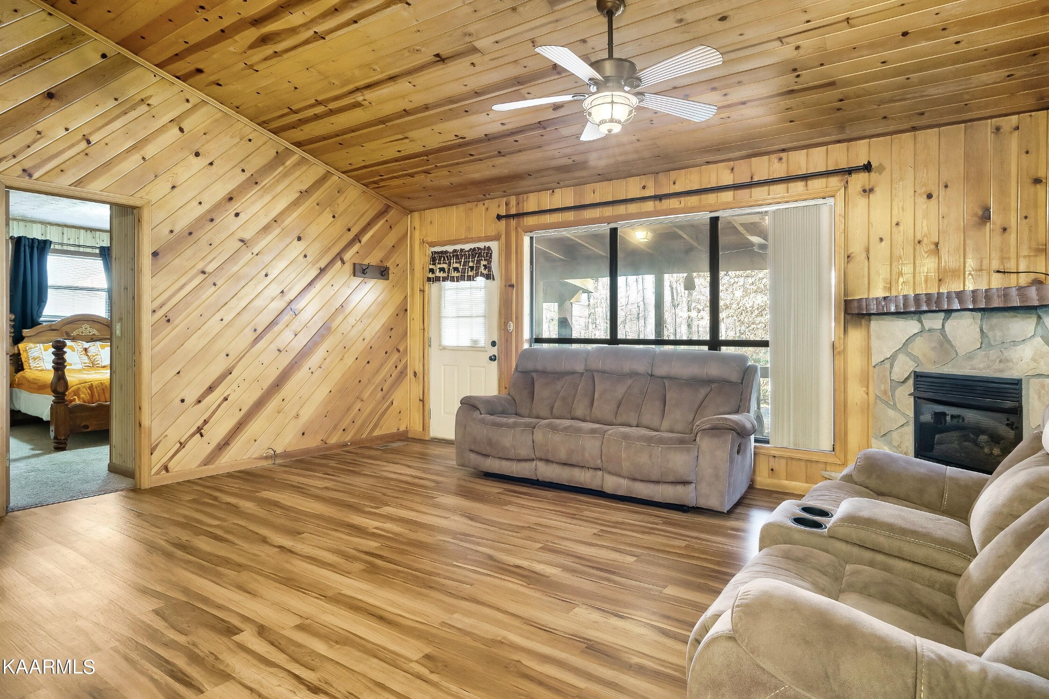 3390 Rocky Ridge Road Cosby, TN 37722 - Photo 34 of 45 a living room with furniture and a fireplace