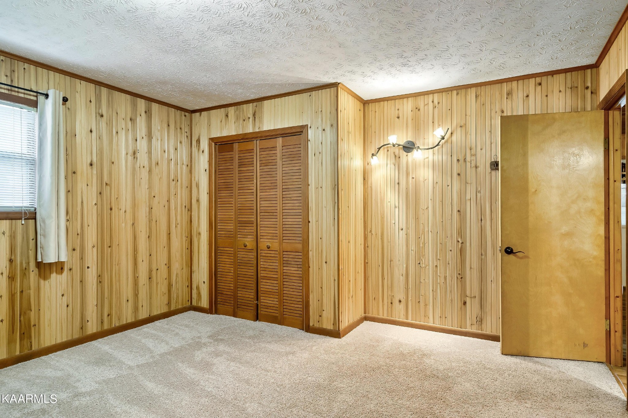 3390 Rocky Ridge Road Cosby, TN 37722 - Photo 41 of 45 a view of a bathroom with shower and a glass door