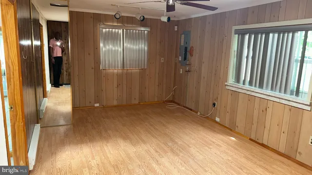 a view of entryway with wooden floor