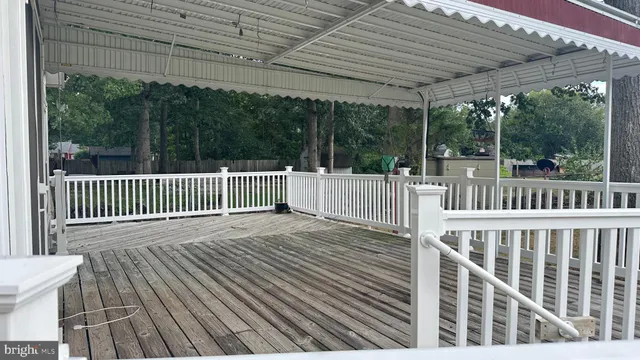 a view of a house with a small yard