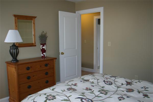 72 Snake Hill Road Ayer, MA 01432 - Photo 18 of 23 a bedroom with a bed and a dresser