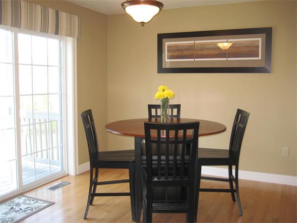 72 Snake Hill Road Ayer, MA 01432 - Photo 7 of 23 a view of a dining room with furniture and wooden floor