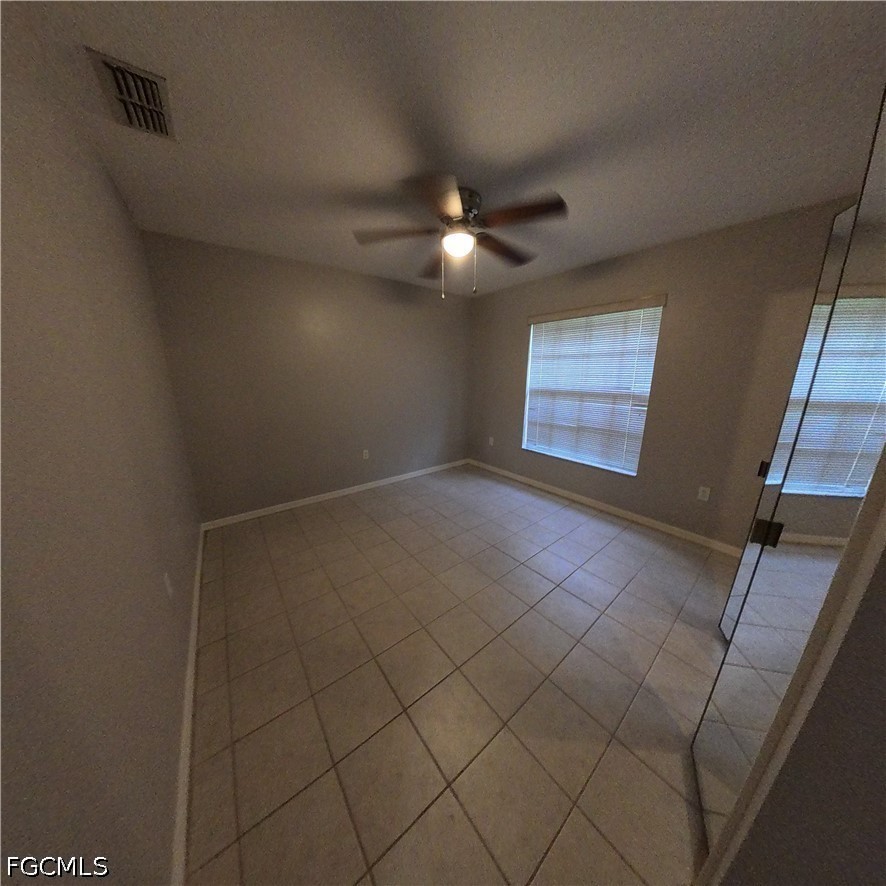 546 Whispering Wind Bend Lehigh Acres, FL 33974 - Photo 6 of 23
