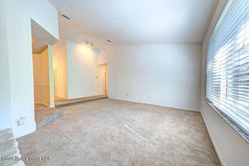 4116 Sparrow Hawk Road Melbourne, FL 32934 - Photo 17 of 70 Formal Living Room View 3