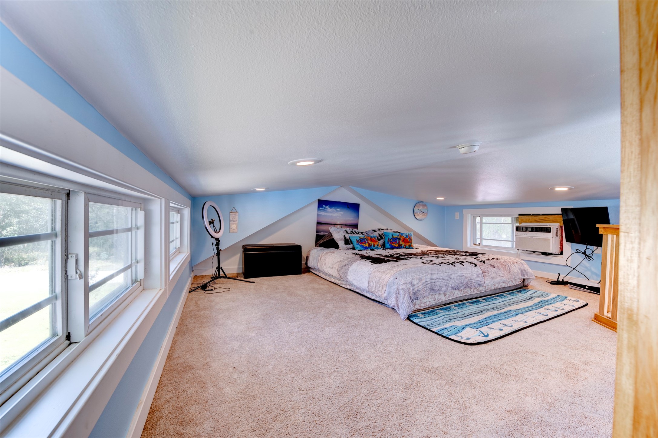 664 Jensen Drive Cleveland, TX 77327 - Photo 15 of 36 a living room with furniture and a large window