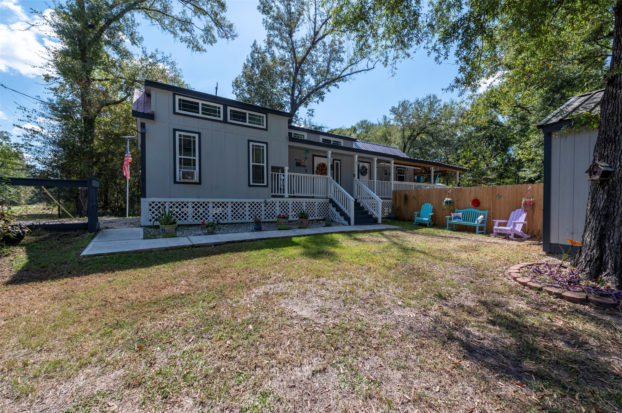 664 Jensen Drive Cleveland, TX 77327 - Photo 23 of 36 a view of a house with backyard and sitting area