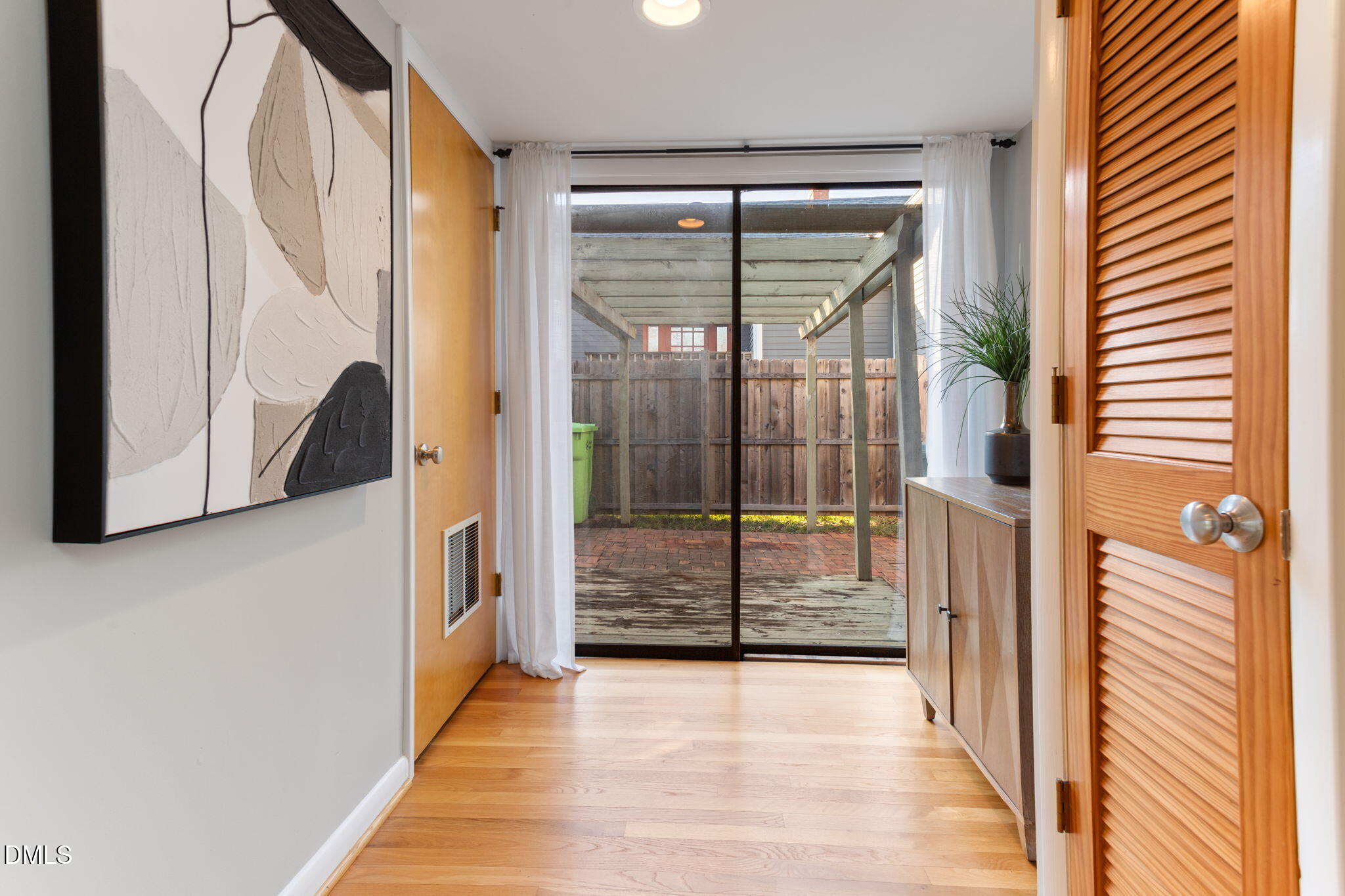 709 West North Street Raleigh, NC 27603 - Photo 29 of 42 a view of a glass door with a glass door
