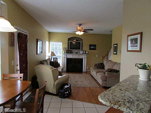 2585 Tuttle Road Walnut Cove, NC 27052 - Photo 12 of 16 Den/Family/Great Room. Beautiful fireplace w/ gas logs, hardwood floors & more in this Den thats open to Kitchen!