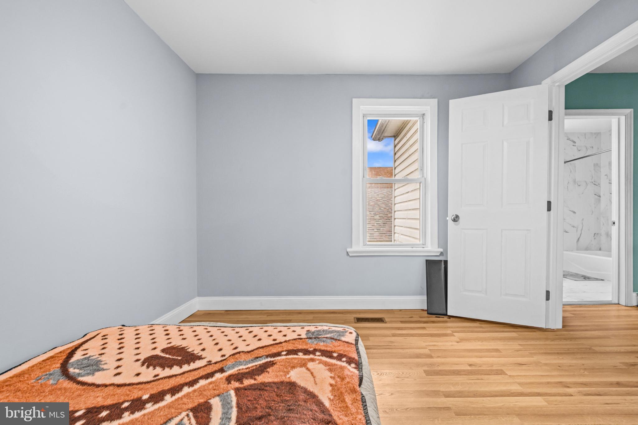 46 Boone Street Cumberland, MD 21502 - Photo 20 of 35 Bright and inviting bedroom space.